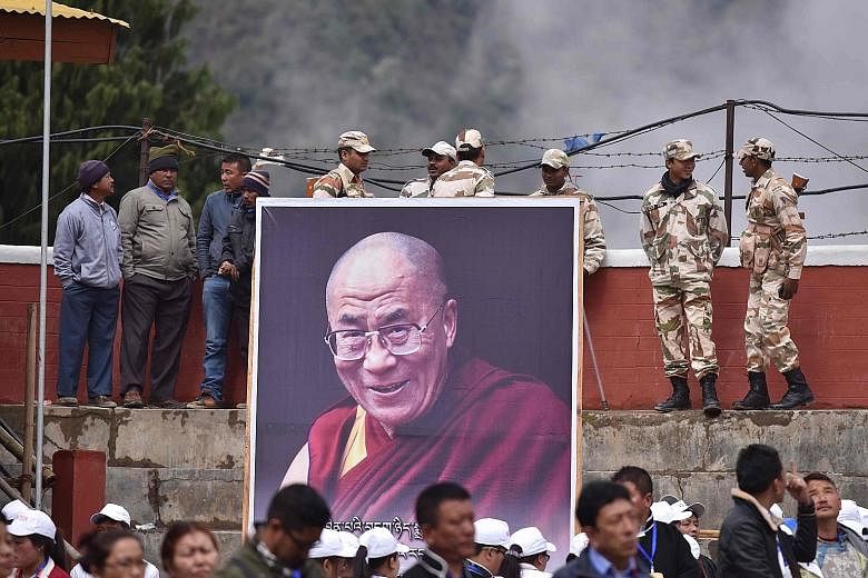 Large crowds turned out in Bomdila, a town in India's Arunachal Pradesh state, to welcome the Dalai Lama on Tuesday.