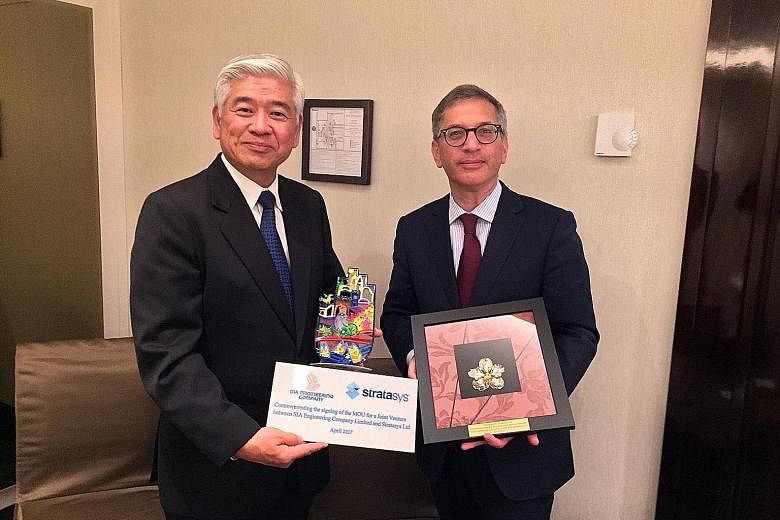 Chief executive of SIAEC Png Kim Chiang (left) and chief executive of Stratasys Ilan Levin signed a memorandum of understanding for the two firms to collaborate on the use of 3D-printed production parts for commercial aviation.