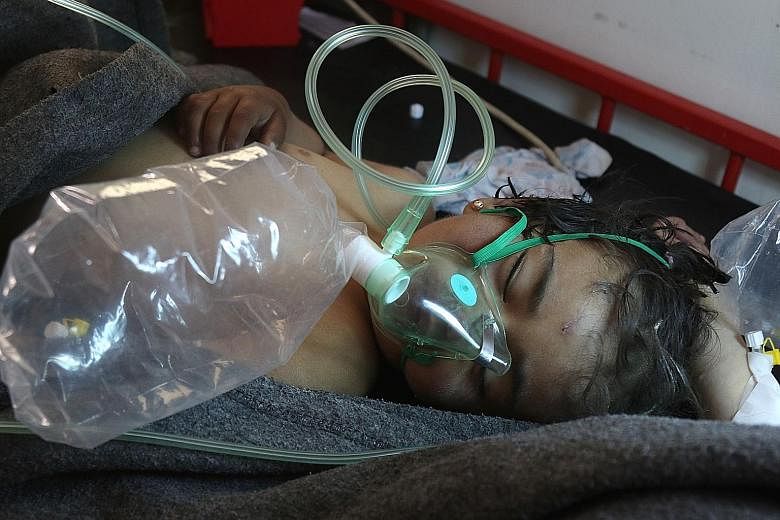 A Syrian child being treated at a small hospital after a suspected toxic gas attack in Khan Sheikhun, a rebel-held town in Syria's north-western Idlib province, as international outrage mounted over the loss of civilian lives. Syrian warplanes have b