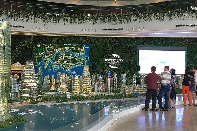 Forest City development's sales gallery in Johor Baru. Chinese buyers of the development's units have been caught out by China's introduction of tighter rules to stem capital flight from the country, with many now unable to service payments after pla