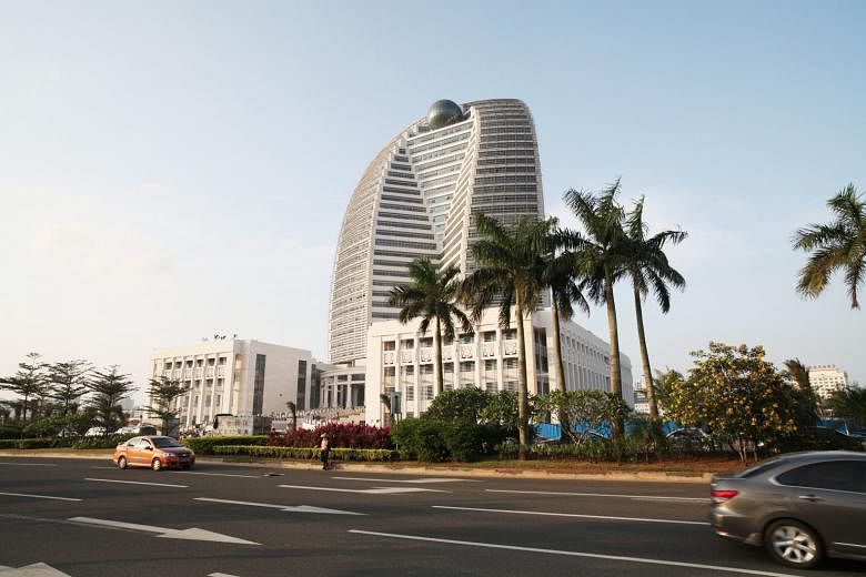 HNA's corporate headquarters in the city of Haikou, China. HNA, one of China's most acquisitive companies, started talks in May last year about buying a stake in CWT. 