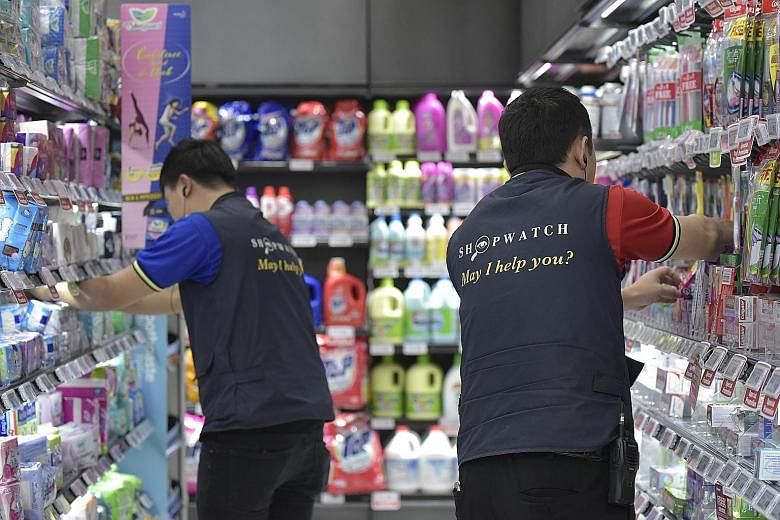 At Sheng Siong supermarkets, employees trained to identify possible shoplifters wear vests printed with the words "ShopWatch. May I help you?" The initiative, a partnership with the police, has helped to reduce thefts by 20 per cent over the last two