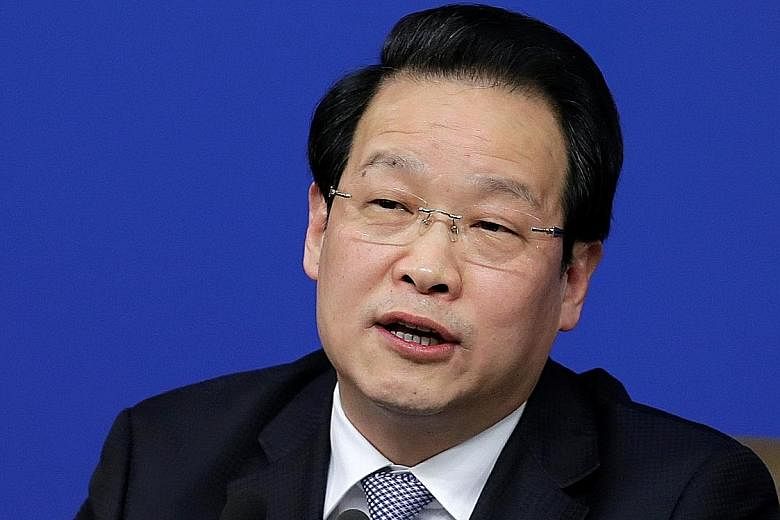 Xiang Junbo heads the China Insurance Regulatory Commission.