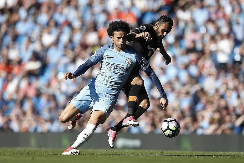 Leroy Sane holding off Hull's Ahmed Elmohamady during Manchester City's 3-1 home win on Saturday. He has settled well into the Premier League after a tough beginning when he moved from Schalke.