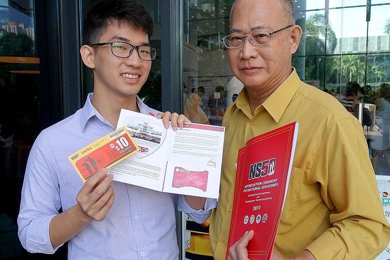 Mr Melvin Tan De Zheng, 26, and his father Dave Tan Jong, 65, were among the 500 national servicemen who received their NS50 packages at ceremonies yesterday. The packages will be given out at 52 ceremonies over these two months, and many others will