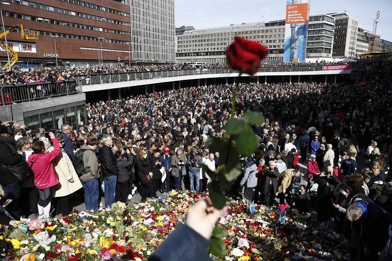 Thousands attended the memorial ceremony yesterday at Sergelstorg plaza to remember the victims of the attack in Stockholm. The site was close to the point where the truck drove into a department store.