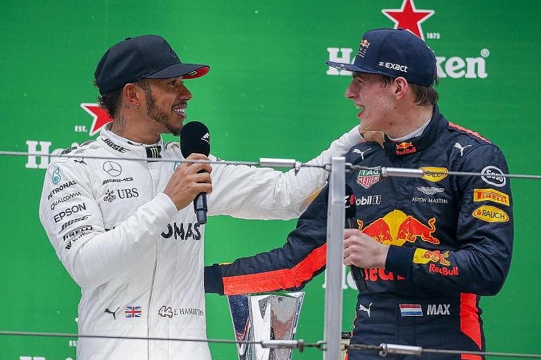 Lewis Hamilton (left) with Max Verstappen on the podium after the Mercedes driver won the Shanghai Grand Prix last Sunday. The Briton called the third-placed Dutchman "this young guy" and then, when lightheartedly challenged by Verstappen, quickly am