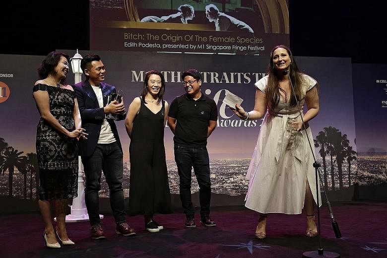 The team behind B*tch: The Origin Of The Female Species, a winner at the M1-The Straits Times Life Theatre Awards - (from left) actress Chanel Ariel Chan, lighting designer Adrian Tan, production/stage manager Mirabel Neo, multimedia designer Brian G