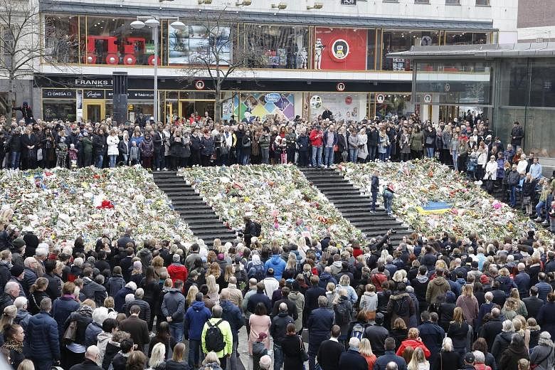 The royal family joined members of the public in Stockholm to observe a minute of silence for the victims.