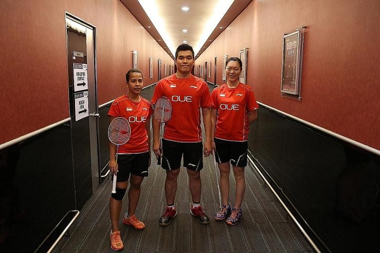 (From left) Doubles badminton players Citra Putri Sari Dewi, Bimo Adi Prakoso and Jin Yujia all came to Singapore not via the Foreign Sports Talent scheme but to study first, before playing full-time.