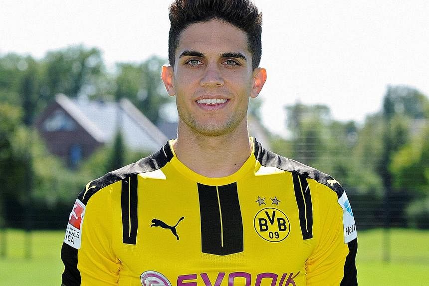 Spanish player Marc Bartra of German football team Borussia Dortmund underwent surgery on a broken wrist after he was hit by flying glass, when the team bus he was travelling in on Tuesday night was rocked by roadside blasts from bombs "containing me
