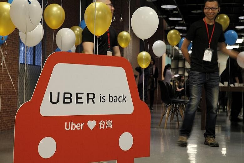 A press conference yesterday announcing the return of Uber's ride-hailing service. Local taxi firms and the Taiwanese authorities had earlier this year accused Uber of misrepresenting its service.