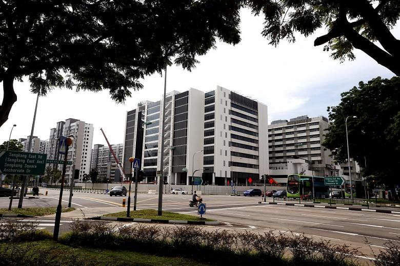 Slated to open next year, the Sengkang General Hospital building looks close to completion. The walls of the building in Anchorvale Street have already been painted, and signs have been put up to point future visitors to the main entrance. When it is