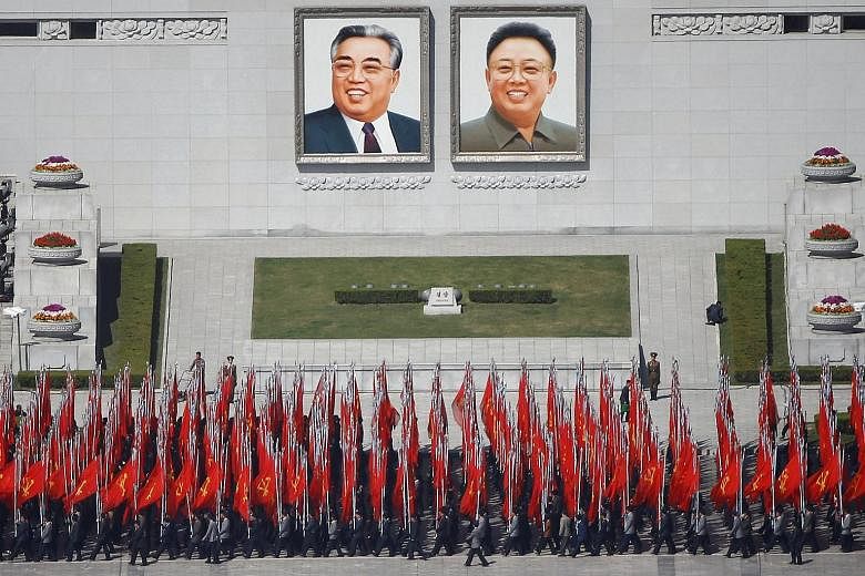 A rehearsal in Pyongyang's Kim Il Sung Square on Wednesday for a parade to mark the 105th birthday of North Korea's founder tomorrow. The portraits are of Kim Il Sung and Kim Jong Il, the father of current leader Kim Jong Un. There has been speculati