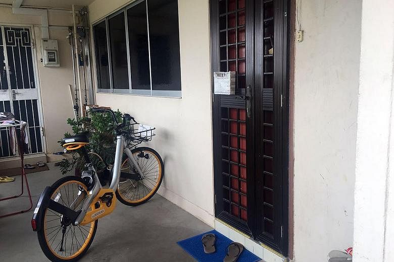 A bicycle belonging to oBike, one of three bike-sharing companies in Singapore, parked outside an 11th-storey Housing Board flat in Yishun. There have been incidents of such two-wheelers being taken home, vandalised or not parked at proper locations 