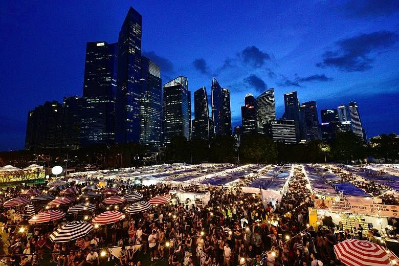 A local edition of Bangkok's popular creative market Artbox arrived at Marina Bayfront yesterday, with an offical light-up of 5,000 fairy lights. Artbox Singapore is Artbox's first overseas installation. Organised by events management company Invade 