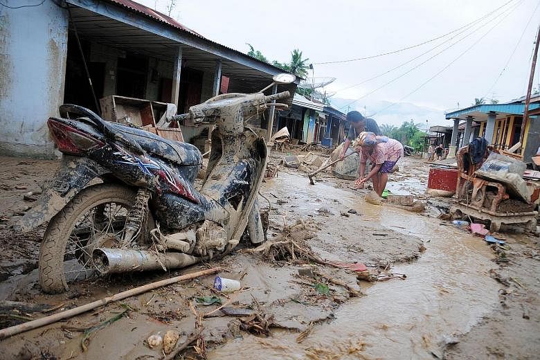 Flash floods in Indonesia's western province of Aceh have left two dead and one missing while damaging hundreds of houses. Heavy downpours on Thursday led to flooding in two districts, said the National Board of Disaster Management. Scores of people 