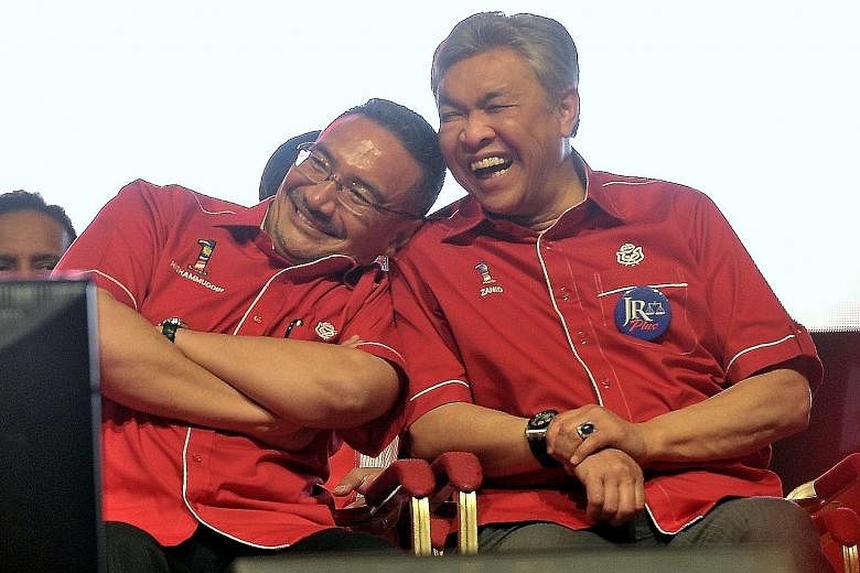 Datuk Seri Hishammuddin Hussein was appointed Special Functions Minister on Tuesday, in addition to being Defence Minister, sparking discussions of a rift between him and Deputy Prime Minister and Home Minister Ahmad Zahid Hamidi (far right). But the