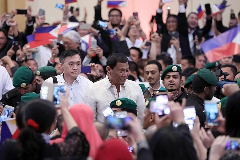 Philippine President Rodrigo Duterte meeting the Filipino community in the Saudi Arabian capital of Riyadh on Wednesday. Over 5,000 Filipino workers were repatriated from the country last year.