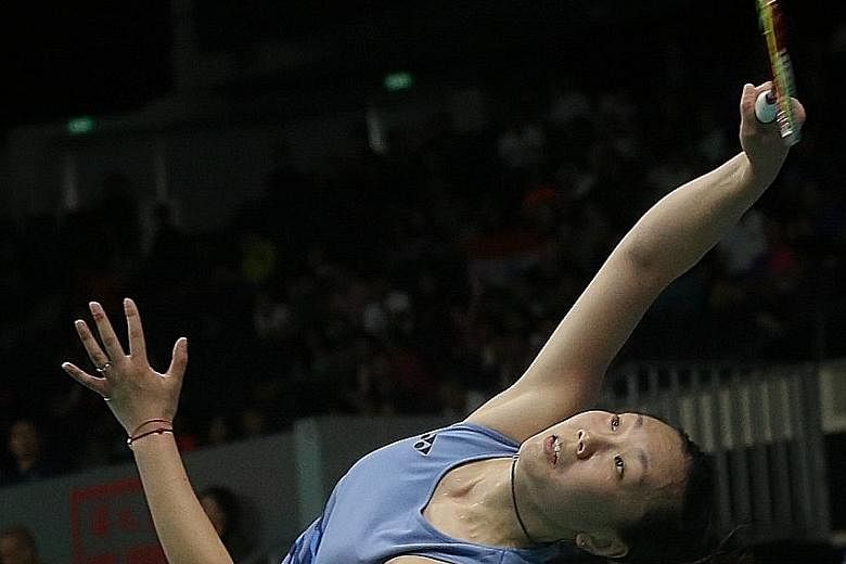 Zhang Beiwen, representing the United States, stretching to return a shot against world No. 4 Akane Yamaguchi of Japan in their quarter-final. She won to set up a clash with top-ranked Tai Tzu-ying.