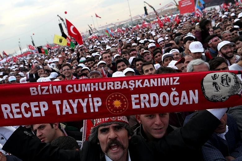 Supporters of Mr Recep Tayyip Erdogan at a "Vote Yes" rally in Istanbul, Turkey, last Saturday. Opponents worry that the new system, if voted in, will move the presidency towards one-man rule.