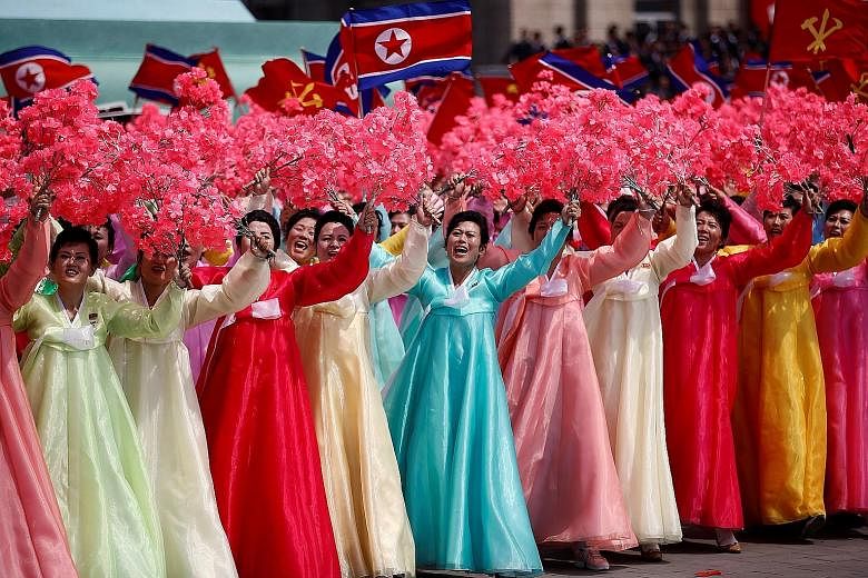 North Korea pulled out all the stops at the parade, and single-engine propeller- powered planes flew in formation over the crowds. Unlike at some previous parades attended by Mr Kim, there did not appear to be a senior Chinese official in attendance 