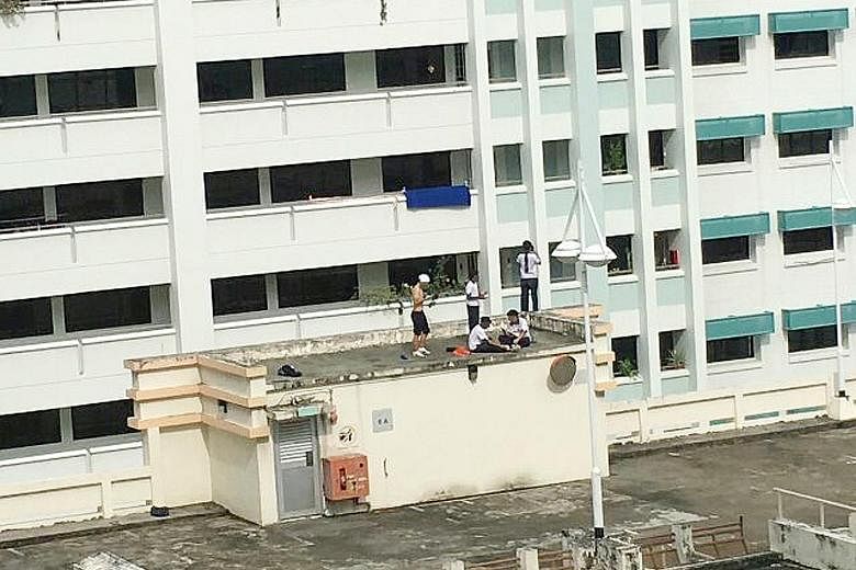 The five students were spotted taking selfies and dancing on the rooftop of the five-storey carpark in Hougang last Wednesday.