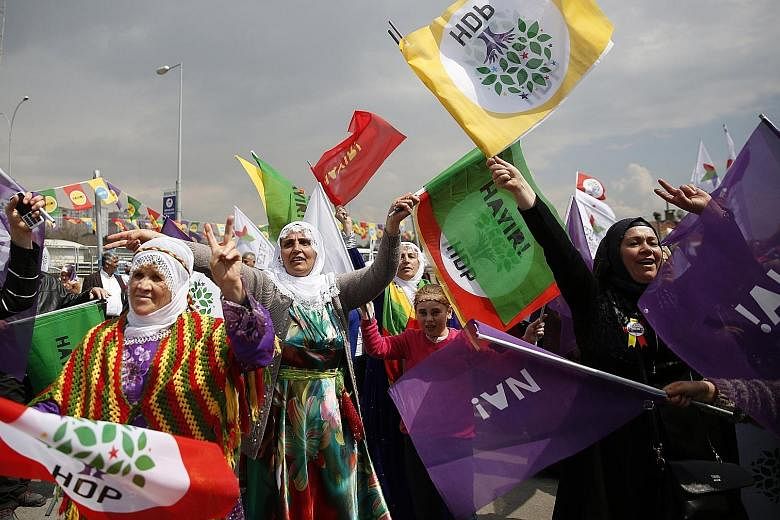 Supporters of pro-Kurdish Peoples' Democratic Party shouting slogans and holding flags saying "no" during a Vote No rally in Istanbul on April 8. A majority "yes" vote in today's referendum on constitutional reform in Turkey will change the country's
