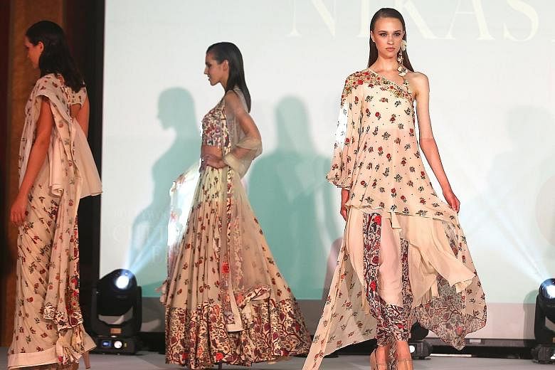 A singing politician and models strutting the stuff of India's foremost fashion designers shared the stage last night for a common cause. They were raising funds for the Singapore Indian Development Association (Sinda), as well as needy families in t