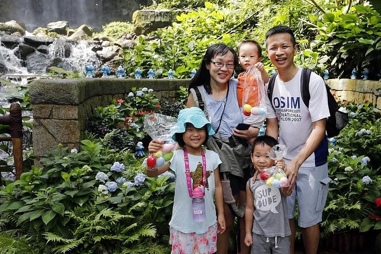 The Ng family - mum Min Yun, 37, carrying Max, two, dad Jeffrey, 39, Luther, four, and Kyra, seven - celebrated Easter Sunday with an egg hunt at Jurong Bird Park's Waterfall Aviary, home to over 600 free-flying birds. It was a treat for the children