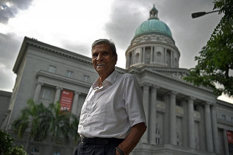 Singapore's oldest practising lawyer, Mr P. Suppiah, in front of the former Supreme Court building. His love of all sports has helped keep him fit and healthy over the years. Once a force in the football arena, he has now turned to golf for a workout