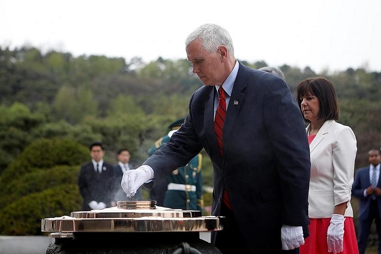 US Vice-President Mike Pence and his wife Karen visiting the Seoul National Cemetery. The symbolic gesture highlights the ties forged between the two allies during the 1950-1953 Korean War.