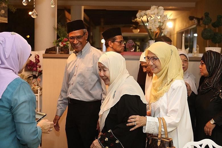 Among those at Mr Othman's wake yesterday were his daughter Lily Othman (far left), former senior minister of state Zainul Abidin Rasheed and Puan Noor Aishah.