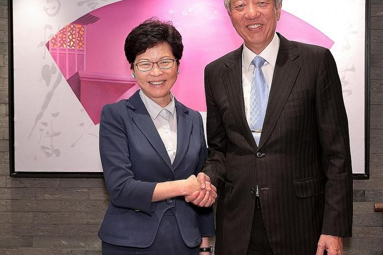 Deputy Prime Minister Teo Chee Hean was hosted to lunch by Hong Kong's Chief Executive-elect Carrie Lam yesterday. Mr Teo, who is on a two-day visit to the city, congratulated Mrs Lam on her recent electoral success, and they exchanged views on devel