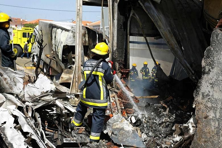 Five people died when a Swiss-registered light aircraft crashed into a supermarket warehouse in Lisbon, Portugal. The twin-engine Piper PA-31 had just taken off on a flight to Marseille on Monday when it crashed, hitting a truck parked at the warehou