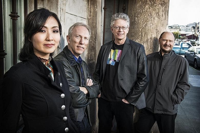 American string ensemble Kronos Quartet, comprising (from far left) Sunny Yang, Hank Dutt, David Harrington and John Sherba, will give their new work My Lai its Asia-Pacific premiere during the festival.