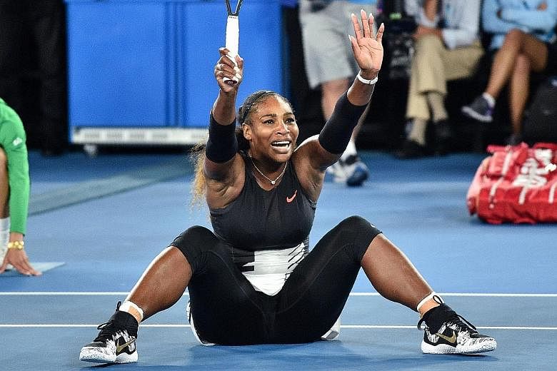 Serena Williams celebrating her Australian Open victory in January. She hinted yesterday that she is 20 weeks pregnant, meaning she was with child when she won at Melbourne Park.