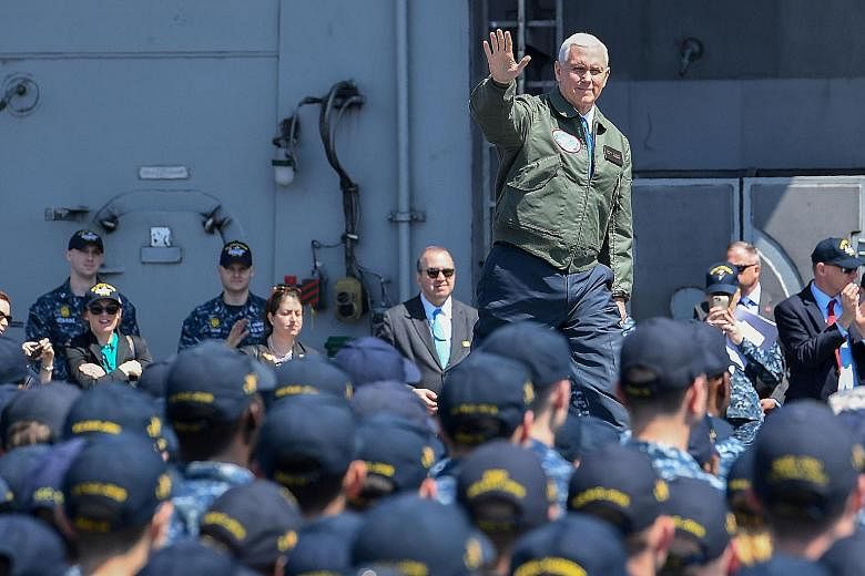 US Vice-President Mike Pence on board the USS Ronald Reagan yesterday. He told 2,500 military personnel at the Yokosuka Naval Base that "North Korea is the most dangerous and urgent threat to peace and security in the Asia-Pacific".