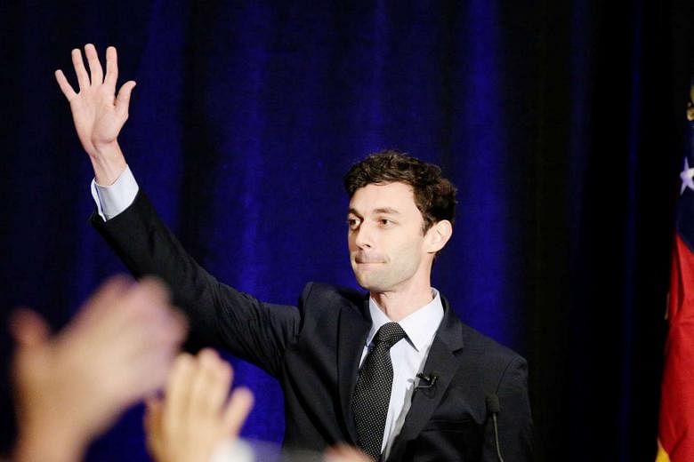 Congressional candidate Jon Ossoff at a post-election party in Sandy Springs, Georgia, on Tuesday. He finished first in a crowded field of candidates, but fell short of the 50 per cent of votes needed to win. The run-off election will be on June 20. Pundi