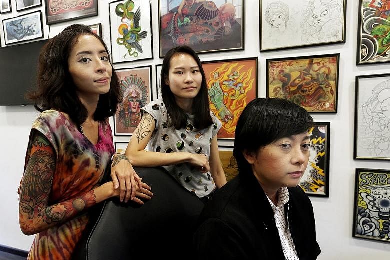 Galaxy Tattoo 2's Louise Ong (above) and Traditions Tattoo Collective's (below, from left) Anthea Tan, Lin Yu Shan and Lee Wai Leng will be at the inaugural Singapore Ink Show, which runs till Sunday.