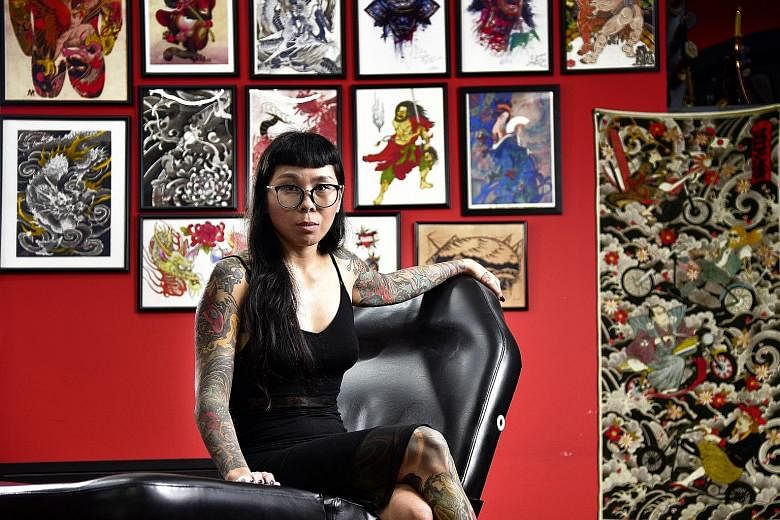 Galaxy Tattoo 2's Louise Ong (above) and Traditions Tattoo Collective's (below, from left) Anthea Tan, Lin Yu Shan and Lee Wai Leng will be at the inaugural Singapore Ink Show, which runs till Sunday.