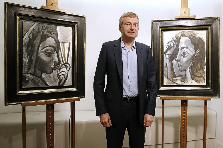 Russian billionaire Dmitry Rybolovlev (left) had brought the US$1 billion (S$1.4 billion) lawsuit against Swiss freeport magnate Yves Bouvier in March 2015 for allegedly inflating the prices of art masterpieces and pocketing the profit. Mr Bouvier ha