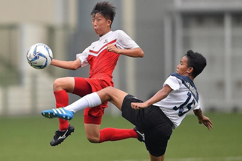 Singapore Sports School (SSP) lifted the Premier League 1 B Division title yesterday after beating Meridian Secondary School (in blue and white) 4-2 on penalties at the Jalan Besar Stadium. The match ended 2-2 at full-time.