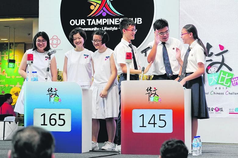 The Nanyang Girls' High team, consisting of (from left) Lim Tse Hwee, Yan Bin Bin and Chen Nan, won the secondary school category of the challenge for the third consecutive year, beating Dunman High's (from left) Hiew Min Zong, Shu Tian Yi and Neo Hu