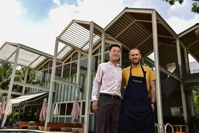 Human resources director New Kheng Tiong, 43, and executive chef Eche Garcia Pau, 32, at FOC Sentosa. The restaurant chain has helped to provide training to individuals who lack the relevant qualifications.