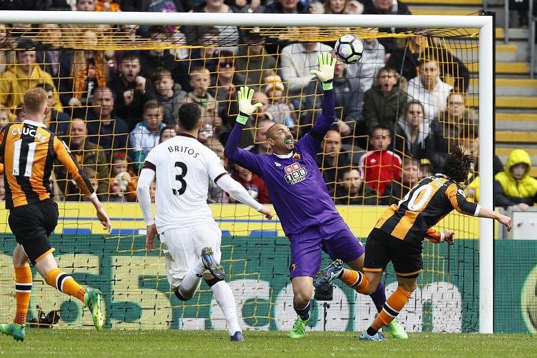 Winger Lazar Markovic, on loan from Liverpool, scoring Hull's first goal past Watford goalkeeper Huerelho Gomes and defender Miguel Britos. The 2-0 win kept them two points above the relegation zone as Swansea, one spot back, also beat Stoke 2-0.
