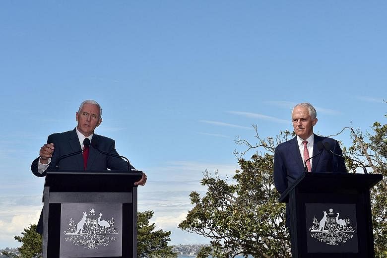 US Vice-President Mike Pence (left) told media at a joint news conference held with Australian Prime Minister Malcolm Turnbull in Sydney yesterday that the deal would be subject to vetting and honouring it "doesn't mean that we admire the agreement".