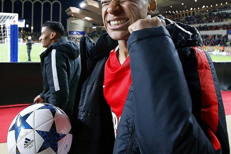 Monaco's Kylian Mbappe, 18, celebrates after his side's 3-1 Champions League victory against Borussia Dortmund on April 19. The teenager is a star performer in Europe's most potent attacking side.