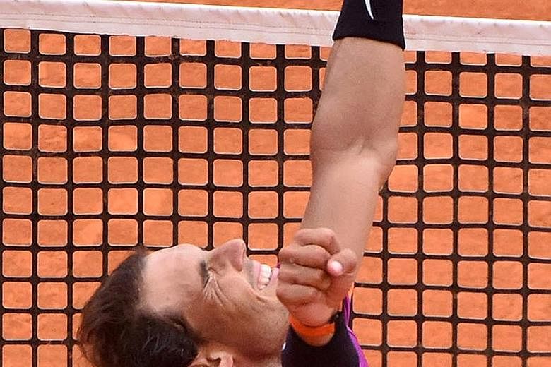Arms raised in victory, Rafael Nadal celebrates his 10th Monte Carlo Masters title. The Spaniard said that the win here is important preparation in his bid for a 10th French Open next month.
