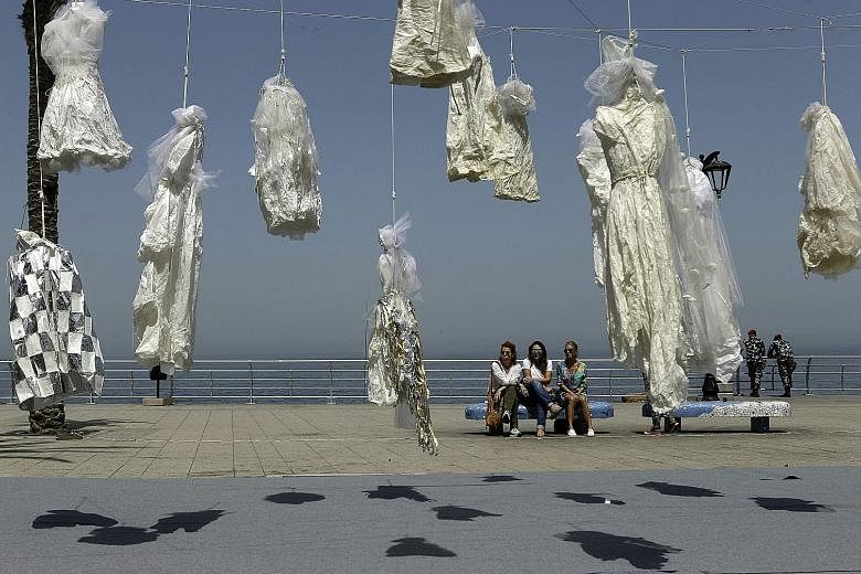 The exhibit in Beirut by non-governmental organisation ABAAD, which features 31 wedding dresses hanging from nooses, is part of the campaign against the controversial Article 522 of the Penal Code, which allows rapists who marry their victims to go f